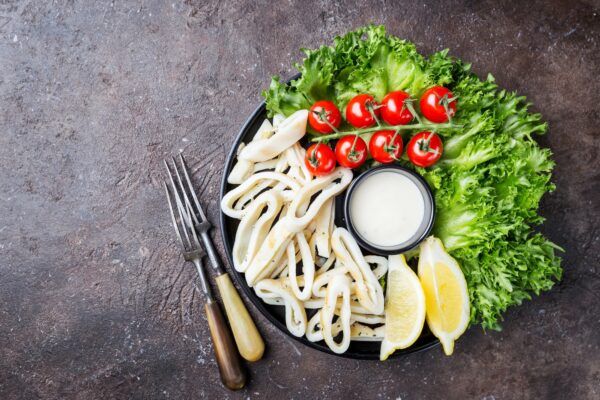 Squid salad and fresh vegetables